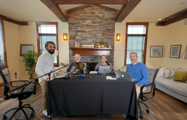 The Public Square team recording an audio podcast at a studio table
