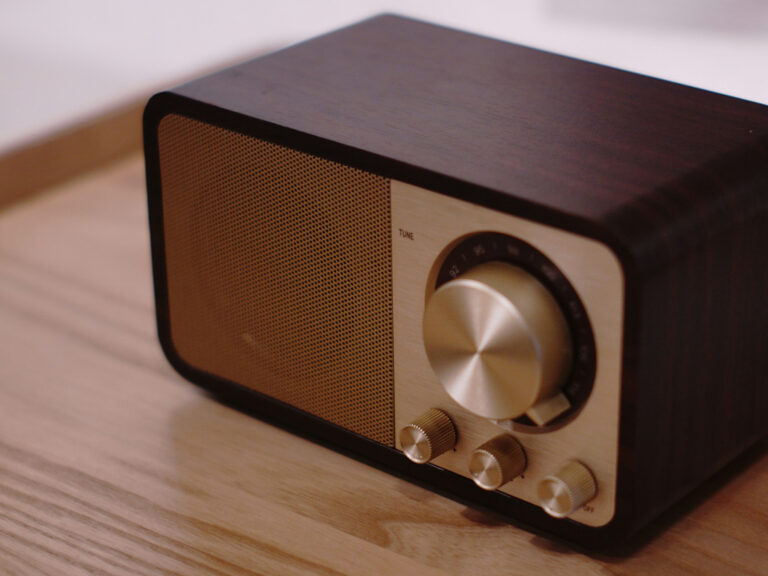 vintage wooden radio with tuner knobs